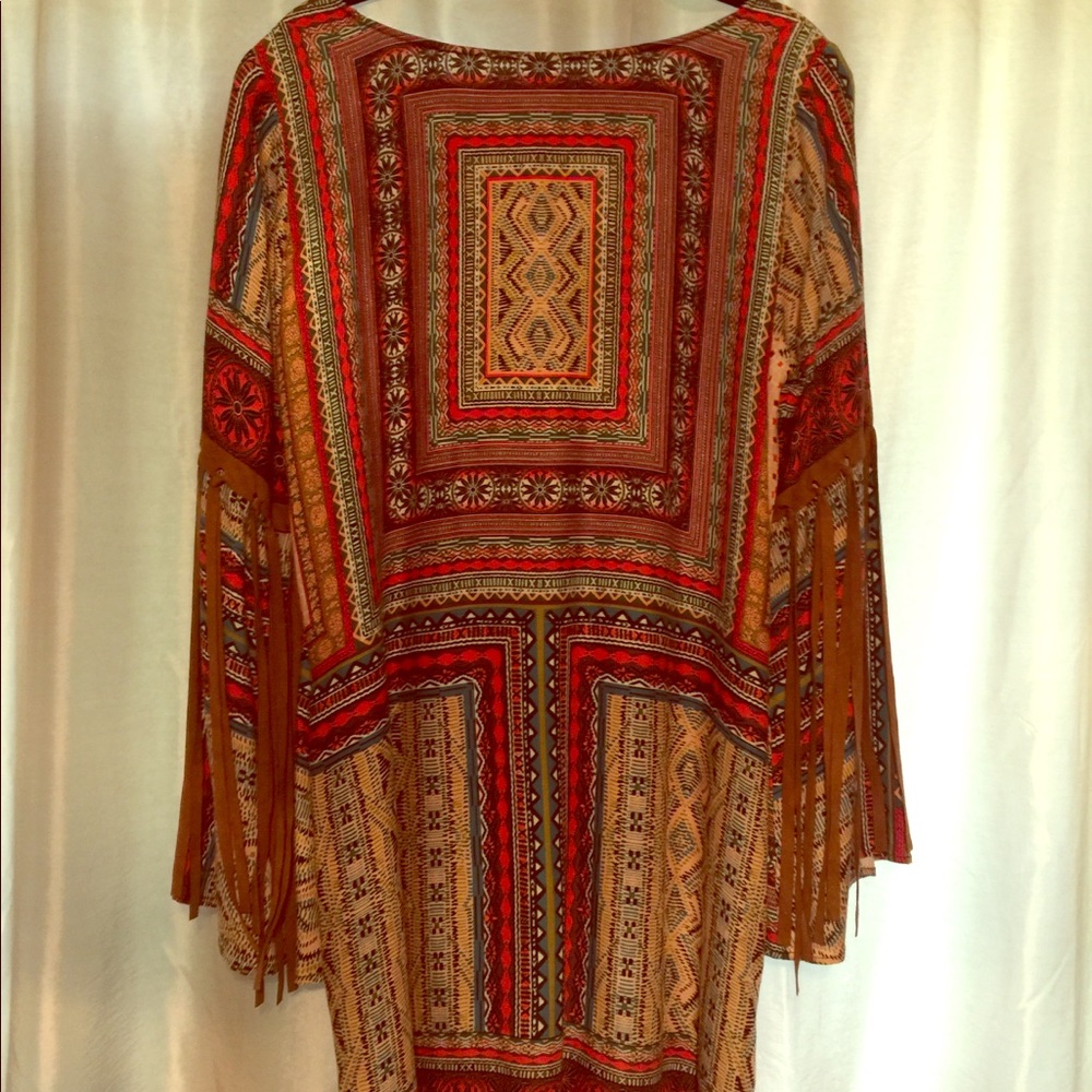 Dress with leather fringed sleeves